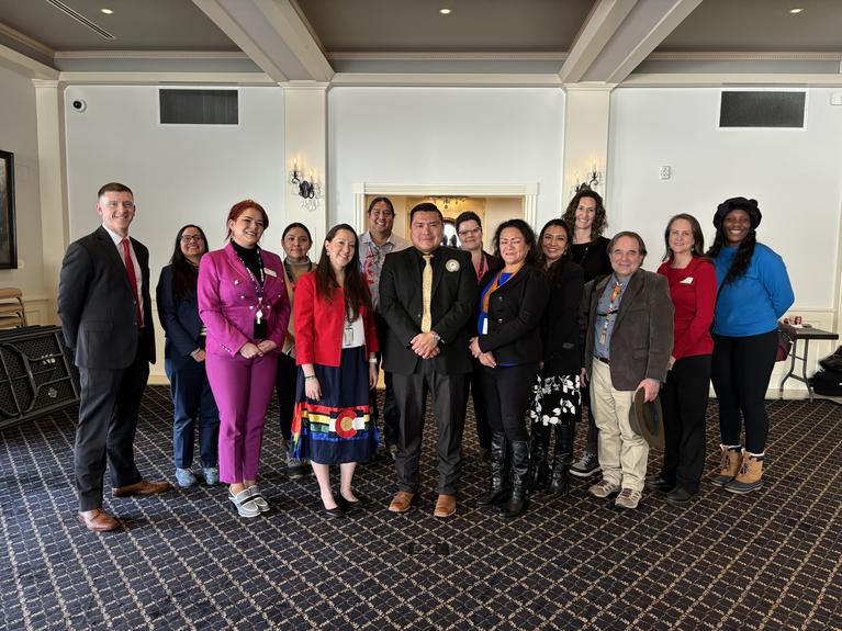 UMUT Councilman Jacket pictured with state staff at a breakout session during Ute Day at the Capitol