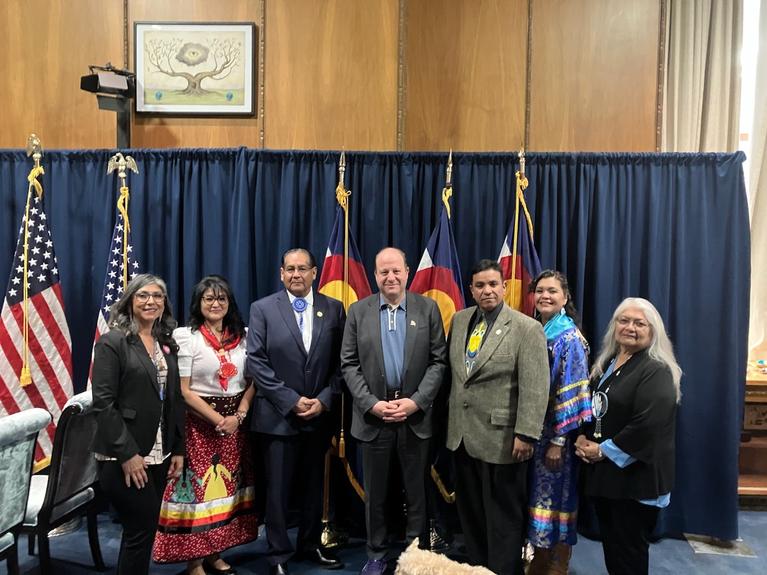 Governor Jared Polis pictured with the Southern Ute Tribal Council
